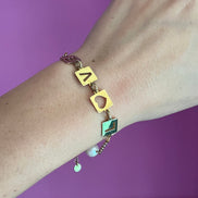 Braccialetto LOVE in oro con perle barocche