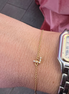 Braccialetto in oro 18kt con lettera di brillanti