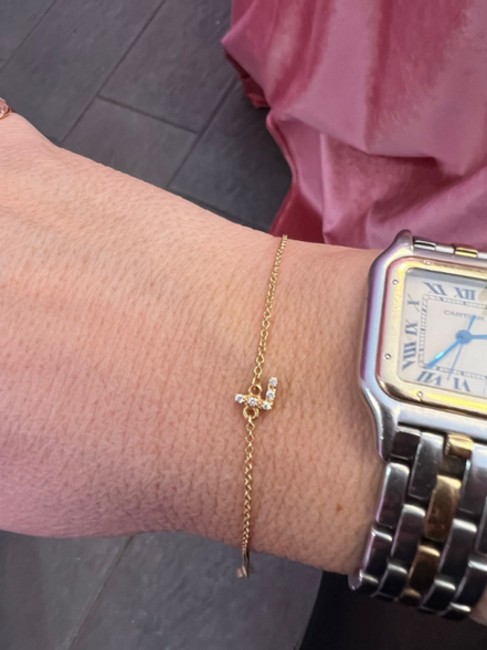 Braccialetto in oro 18kt con lettera di brillanti