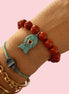 Bracciale Bisette - JAIPUR Medietrranea  corallo rosso  con charm pesciolino turchese (cuore Rubellite )