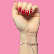 Braccialetto smaltato cuori rosa chiaro