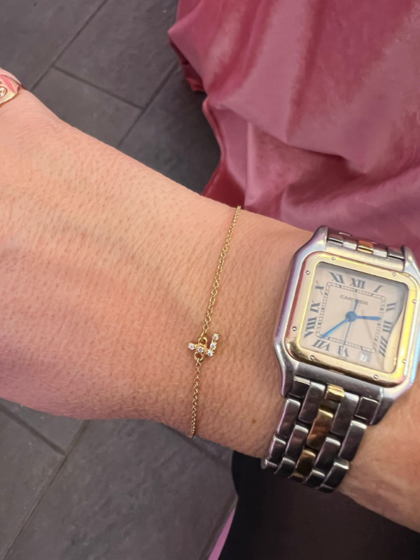 Braccialetto in oro 18kt con lettera di brillanti