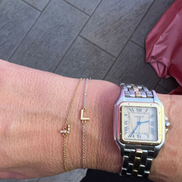 Braccialetto in oro 18kt con lettera di brillanti