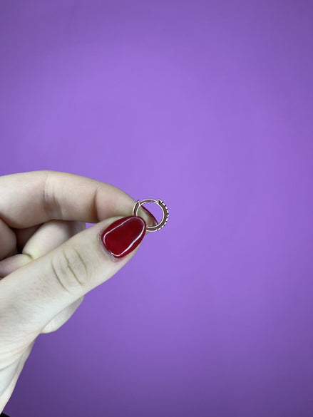 Anelle oro rosa con zirconi neri