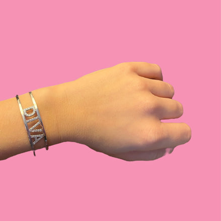 BRACCIALE LUCE CON ZIRCONI - cuori intrecciati