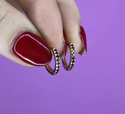 Anelle oro rosa con zirconi neri