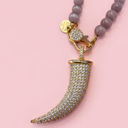 Collana TALISMANI - occhi di gatto mauve   mm 6 - chiusura gioiello - cm 60 - charm corno