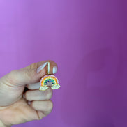 Mono orecchino con arcobaleno