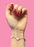 Braccialetto smaltato cuori rosa chiaro