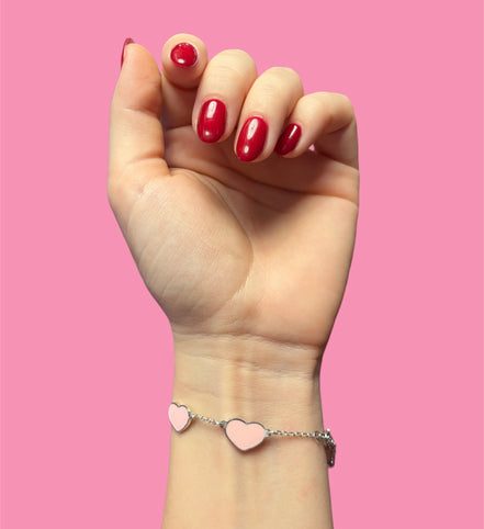 Braccialetto smaltato cuori rosa chiaro