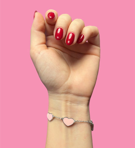 Braccialetto smaltato cuori rosa chiaro