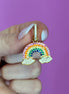 Mono orecchino con arcobaleno