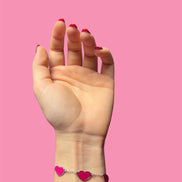 Braccialetto cuori fucsia