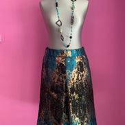 Isabel Allende - Gonna Fonda in broccato oro, turchese e nero