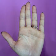 Rose gold ring with HAPPY LUCKY inscription