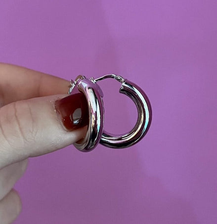 Coppia di anelle bombate argento 925 rodio