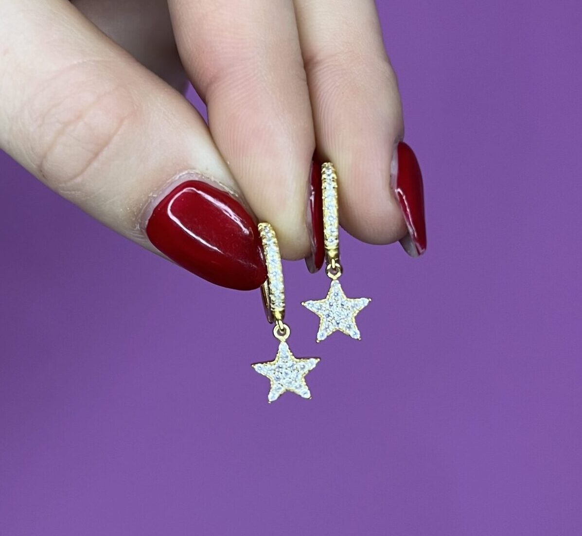 Orecchini anelline oro giallo con stella pendente