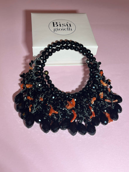 INCANTEVOLE -   MEDITERRANEA Chocker flessibile onic con cascata cristalli neri swarovski e corallo
