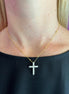 Collana catena oro giallo con piccole sfere e croce pendente di zirconi
