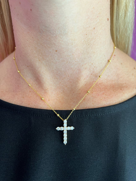Collana catena oro giallo con piccole sfere e croce pendente di zirconi
