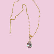 Collana Sfere e Luce - acciaio gold con pendente zircone rimovibile