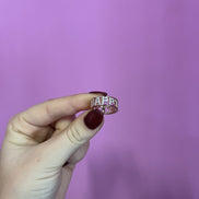 Rose gold ring with HAPPY LUCKY inscription