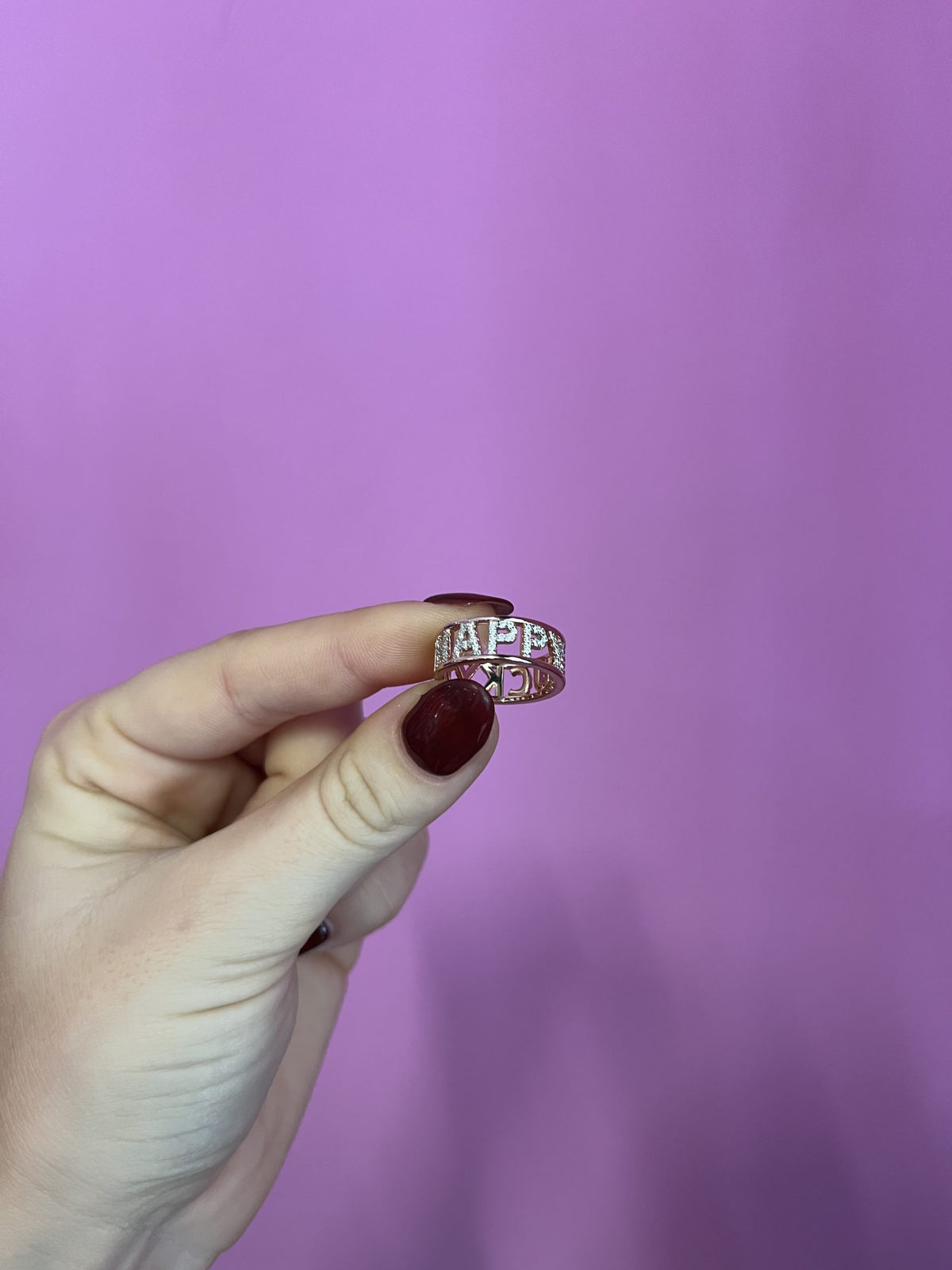 Rose gold ring with HAPPY LUCKY inscription