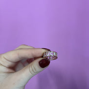 Rose gold ring with HAPPY LUCKY inscription