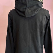 Felpa CHANELLINA : Felpa nera  con passamaneria Couture