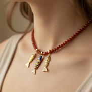 Collana POISSONS - Corallo rosso mm 4 - chiusura argento 925 - cm 45 chrams pesciolini