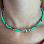 Collier rondelle verdi con stelle rodio e lettera E
