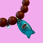Bracciale Bisette - JAIPUR Medietrranea  corallo rosso  con charm pesciolino turchese