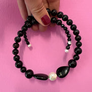 INCANTEVOLE -  Chocker flessibile onice con perla barocca