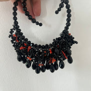INCANTEVOLE -   MEDITERRANEA Chocker flessibile onic con cascata cristalli neri swarovski e corallo