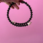INCANTEVOLE -  Chocker flessibile  contrarié di onice e perle barocche  bianche