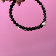 INCANTEVOLE -  Chocker flessibile  contrarié di onice e perle barocche  bianche