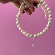 INCANTEVOLE -  Chocker flessibile  perle coltivate  con pendente   tennis argento