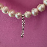 INCANTEVOLE -  Chocker flessibile  perle coltivate  con pendente   tennis argento