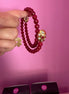 INCANTEVOLE -  Chocker flessibile contrarié  giada ruby sfaccettata con terminali dorati