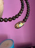 INCANTEVOLE -  Chocker flessibile contrarié  topazio fumé (cm1,2) sfaccettato con terminali ovali dorati agata naturale