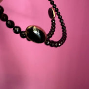 INCANTEVOLE -  Chocker flessibile contrarié  onice sfaccettato con terminali inserti ovali