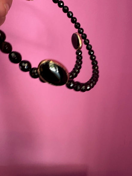INCANTEVOLE -  Chocker flessibile contrarié  onice sfaccettato con terminali inserti ovali