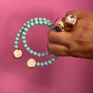 INCANTEVOLE -  OCEANO Chocker flessibile contrarié  turchese  0,8 con terminali madreperla