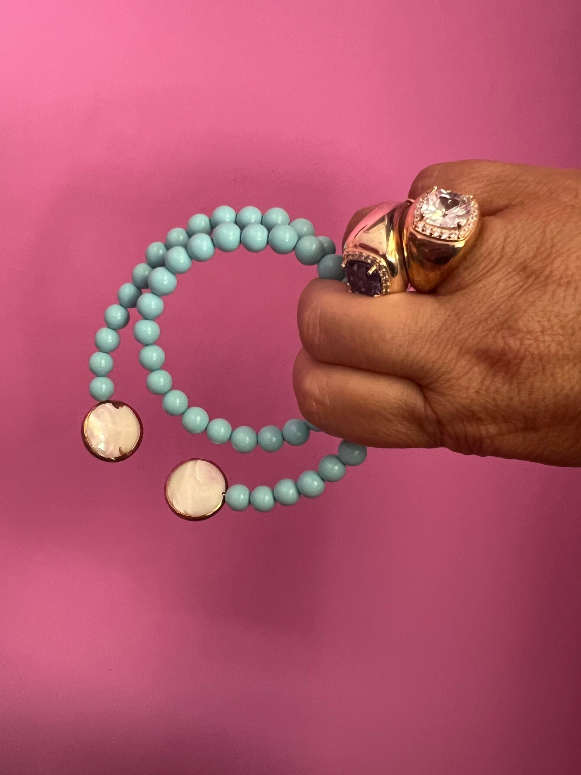 INCANTEVOLE -  OCEANO Chocker flessibile contrarié  turchese  0,8 con terminali madreperla