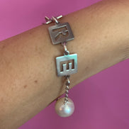 Bracciale AMORE argento 925 rodio con perle semiround