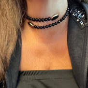 INCANTEVOLE -  Chocker flessibile contrarié  onice sfaccettato con terminali inserti ovali
