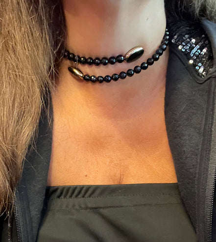 INCANTEVOLE -  Chocker flessibile contrarié  onice sfaccettato con terminali inserti ovali