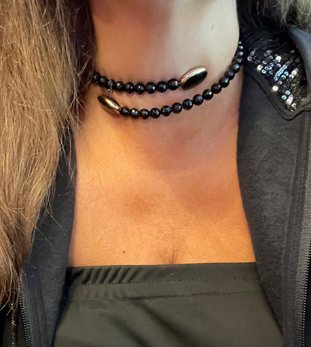 INCANTEVOLE -  Chocker flessibile contrarié  onice sfaccettato con terminali inserti ovali