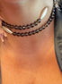 INCANTEVOLE -  Chocker flessibile contrarié  topazio fumé (cm 0,8) sfaccettato con terminali barilotti lunghi conchiglia