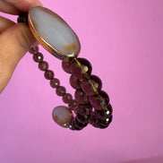 INCANTEVOLE -  Chocker flessibile contrarié  topazio fumé (cm1,2) sfaccettato con terminali ovali lunghi agata
